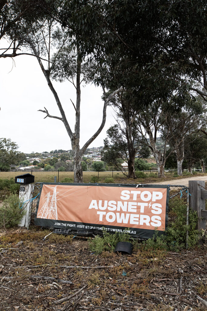 sign with darley in background